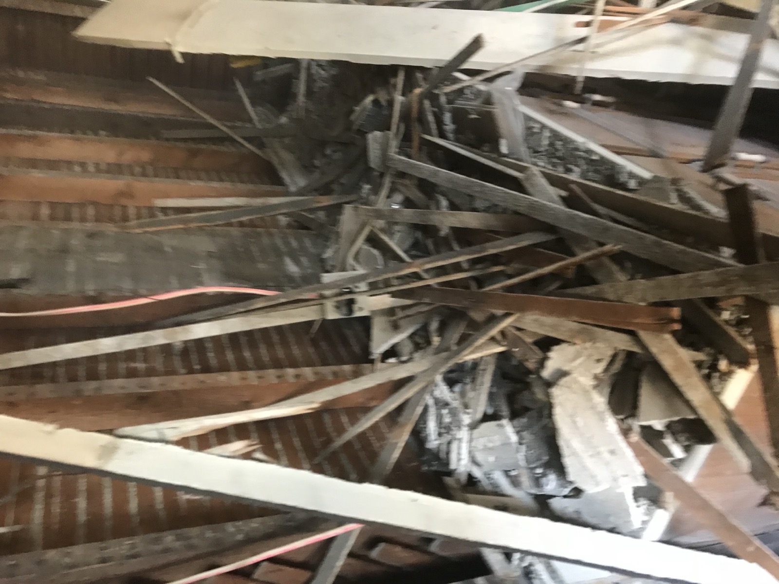Lath, plaster, and framing debris from a selective gut-out