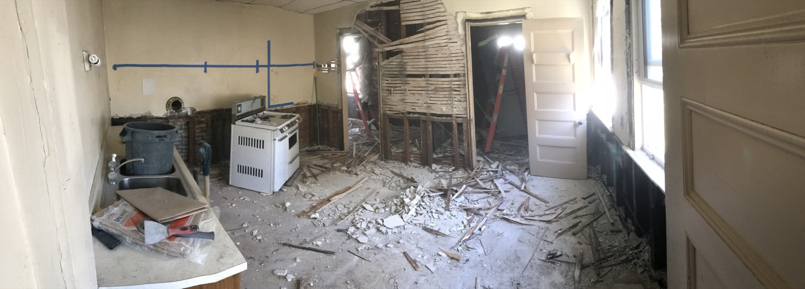Kitchen mid-strip during interior demolition